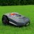 Practixx Mähroboter auf Rasen